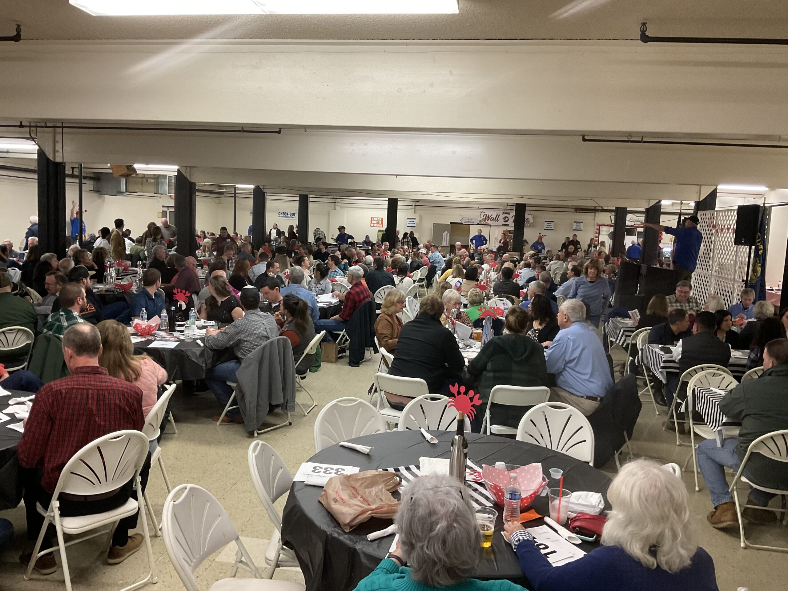 What the Knights of Columbus event looked like, a vast room filled with guests sitting at their tables.